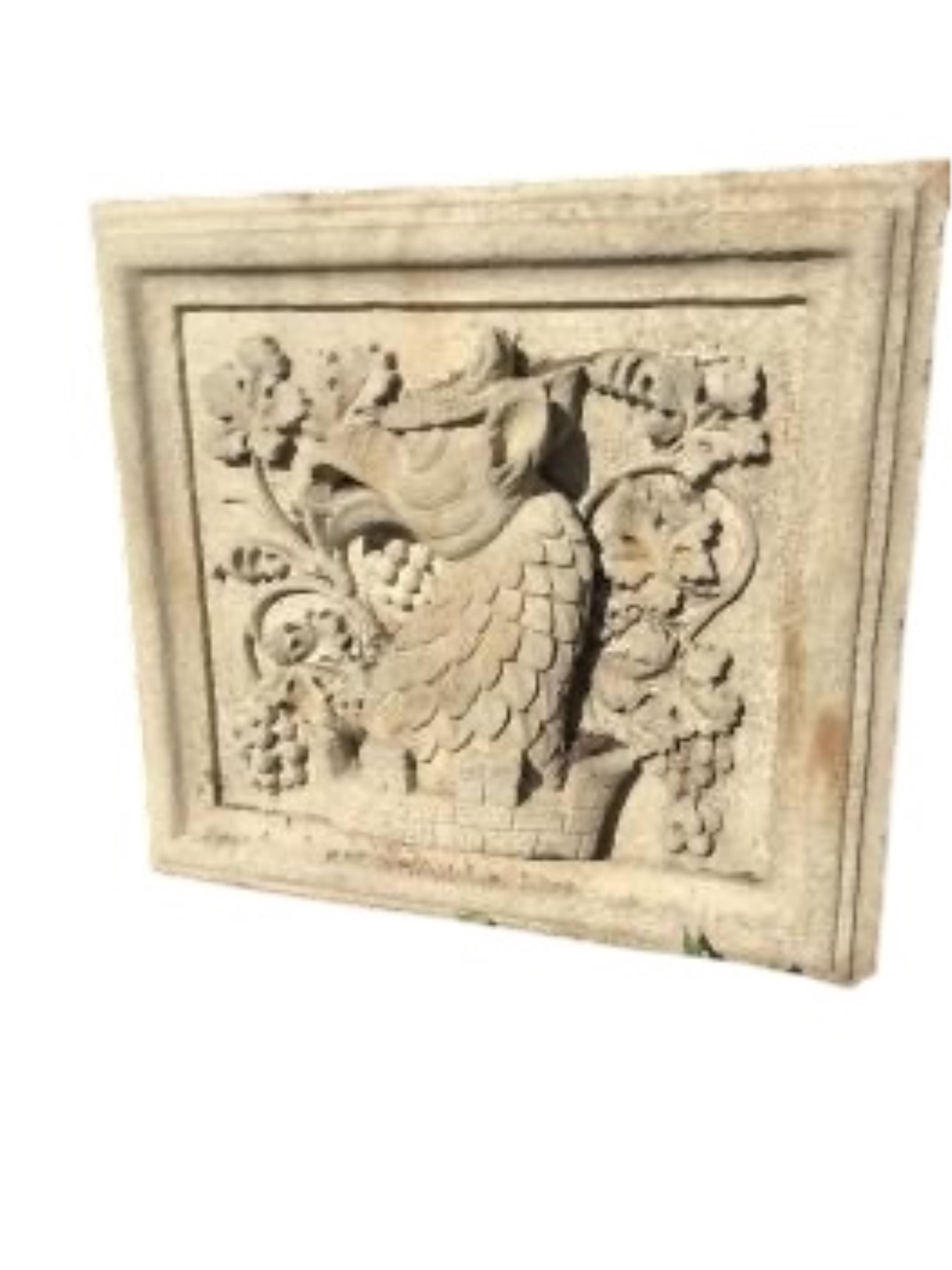 A rectangular cast stone Heraldic garden plaque, width 82cm, height 79cm